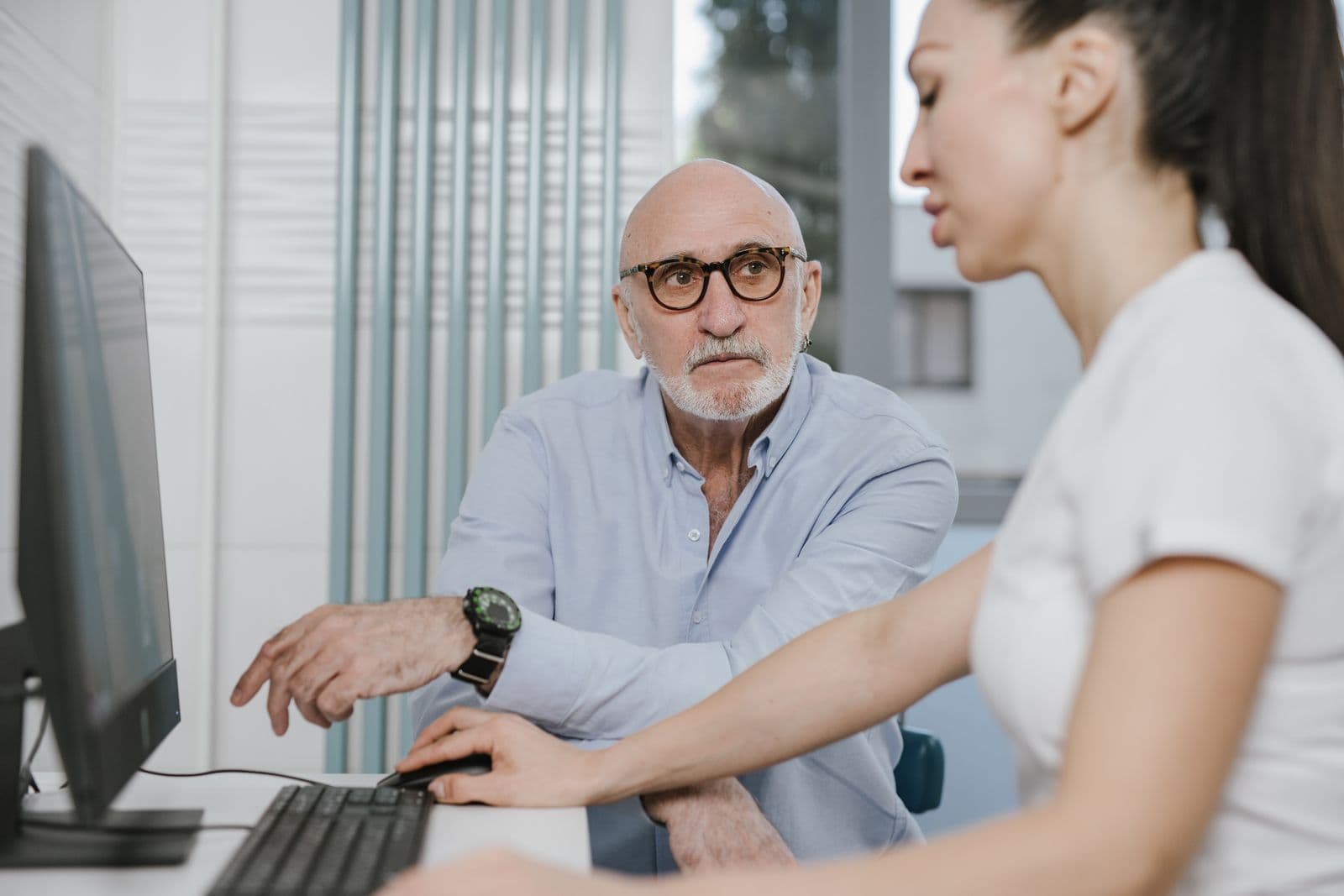 Patient receiving a consultation from a medical professional